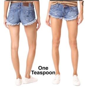 One teaspoon NO 2's  low waist short rise curved hem shorts size 23